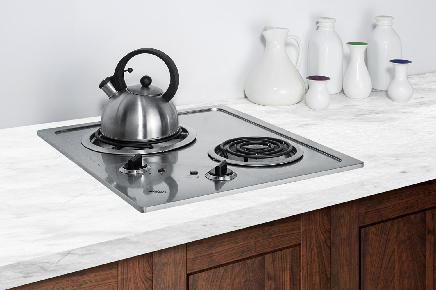 2-burner 230V electric cooktop designed for portrait or landscape installation, with coil elements and stainless steel finish